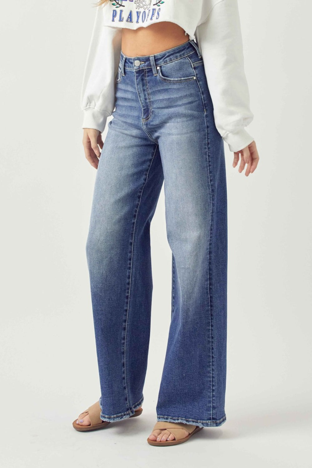 Risen Wide Leg High Rise Jeans with Plus Sizes. A must have boho essential pair of jeans! Wide Leg, High Rise jeans are go-to jeans for any look, any day of the week! Effortless pairing all year long with your boho blouses! Snag you pair before they disappear! Medium wash.