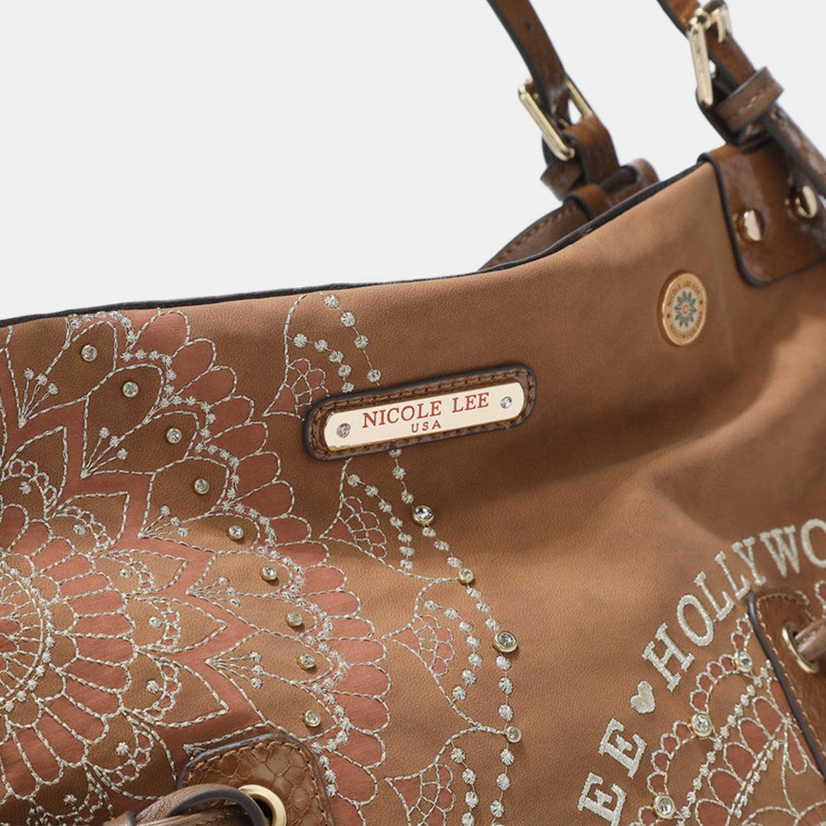 Hobo Bag- Sparkle, Tassel, Repeat; Meet Your New Go to Vegan Hobo Bag
Cruelty-Free never Looked this good! Tassels, rhinestones, embroidery. The unique patterns in this women's hobo bag align with the eclectic, artistic spirit of boho style. The unstructured design offers laid-back, carefree vibe of boho fashion. If you would like to transition seamlessly from day to night, beach to city, or festival to café, grab this bag!