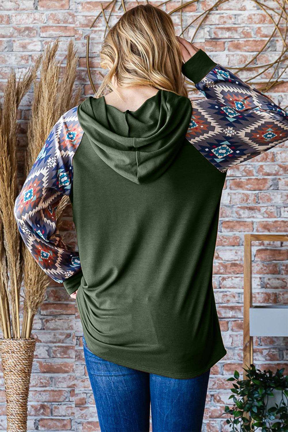 Long Sleeve Hooded Top with Aztec print. Olive Long Sleeve Remix with Plus Size. This shirt is a total staff fav here at Free Soul Threads! We couldn’t resist grabbing ours—make sure you snag yours before they’re gone! Limited sizes available, so don’t wait!