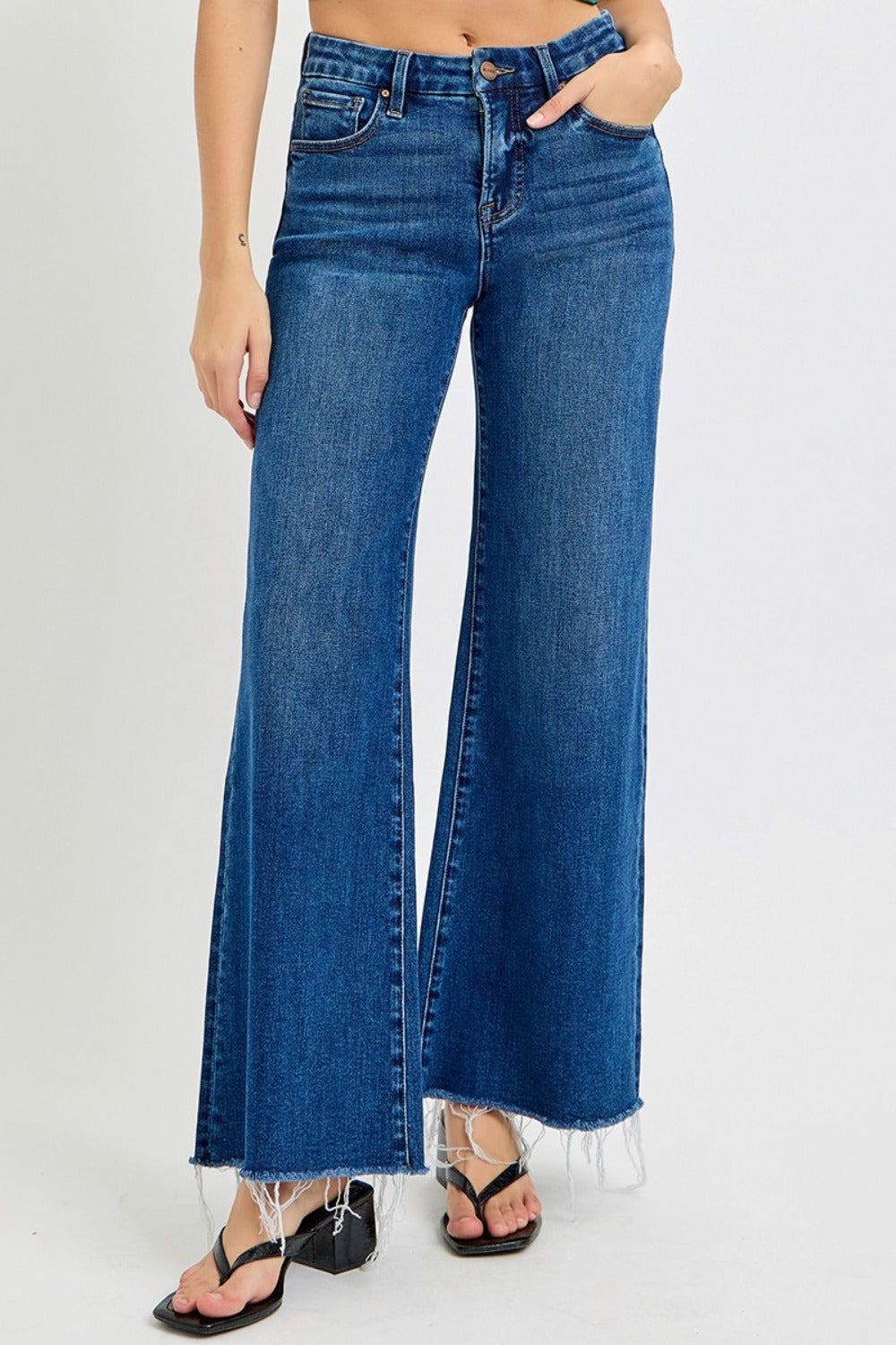 ISEN Tummy Control High Waisted Wide Leg Jeans with Stretch -Holy Grail. Are you tired of form fitting skinny jeans? Looking for a refreshing change; These tummy control wide leg jeans should do the trick.... offering a relaxed and laid-back feel! These will be your go-to jeans if you prioritize comfort when going on a night out or keeping casual on the weekends. Between the stretch, the high waist, and wide legs you are looking at the Holy Grail addition to your jean drawer! Medium Wash.