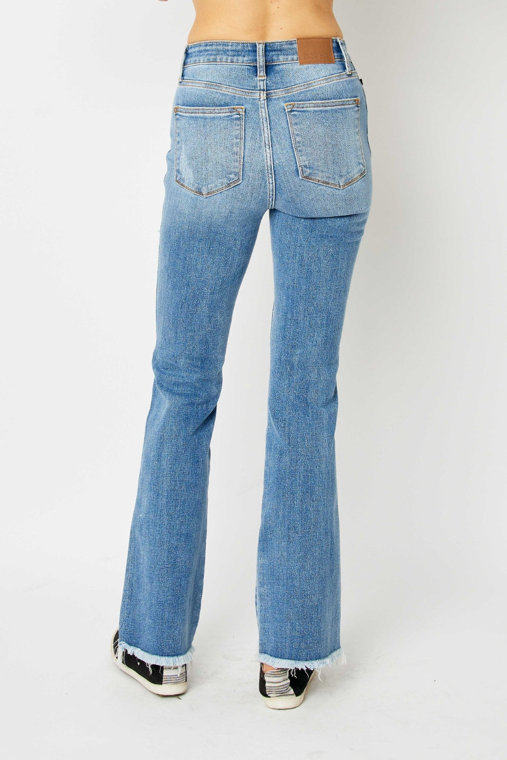Judy Blue Distressed Raw Hem Bootcut Jeans with Plus Sizes. Laid Back Look.