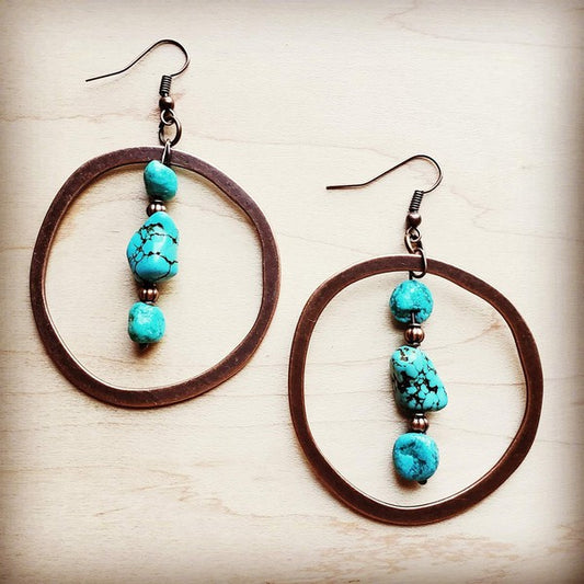 Handcrafted Earrings:

Copper hoop feature
hunks of turquoise and copper
They are the perfect complement to your boho style!
Entire length is approx. 2 inches

*Although your item will resemble the photo,
each piece is created by hand, so no two are identical.
