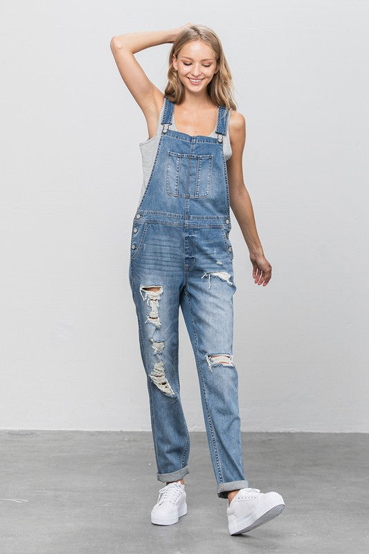 Denim Lab- Patch Pocket Ripped Denim Overalls -Day to Night- Season-to Season.  So essential and always timeless, these overalls are a must-have that your wardrobe has been waiting for! These distressed overalls have vintage appeal and for a casual outing you can wear just about anything!  Worried it is too laid back? To take it from day to night simply dress up with a polished top, fitted sweater, or structured blazer with heels or ankle boots! By the way, straps are adjustable!