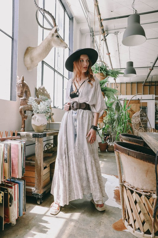 This sheer kimono is your ideal companion when you want to feel like you’re floating through life. Designed for the woman who loves to layer with ease and grace! This free flow Kimono stands out from others as it goes from a minimalist top and transitions beautifully into a rich paisley print as it flows toward the hem, creating a look that’s both modern and timeless. The oversized fit and mid-length sleeves add to the laid-back, breezy vibe, making it the ultimate piece for both lounging and living. 
