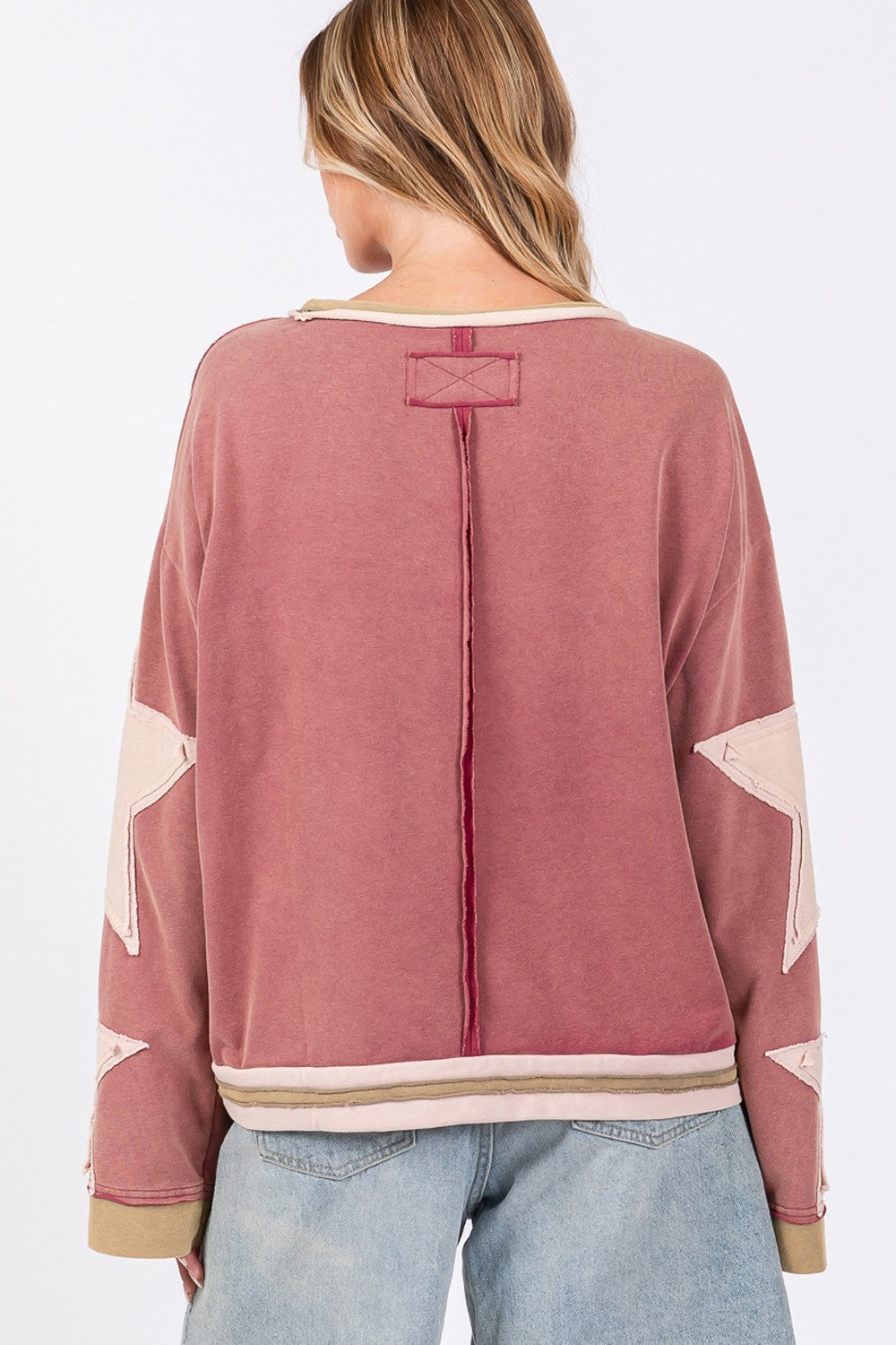 French Terry Sweatshirt- Cosmic Cozy: Pink Star Patch Oversized Sweatshirt.  The French Terry Star Applique Patch Sweatshirt is a chic and cozy option for your wardrobe.