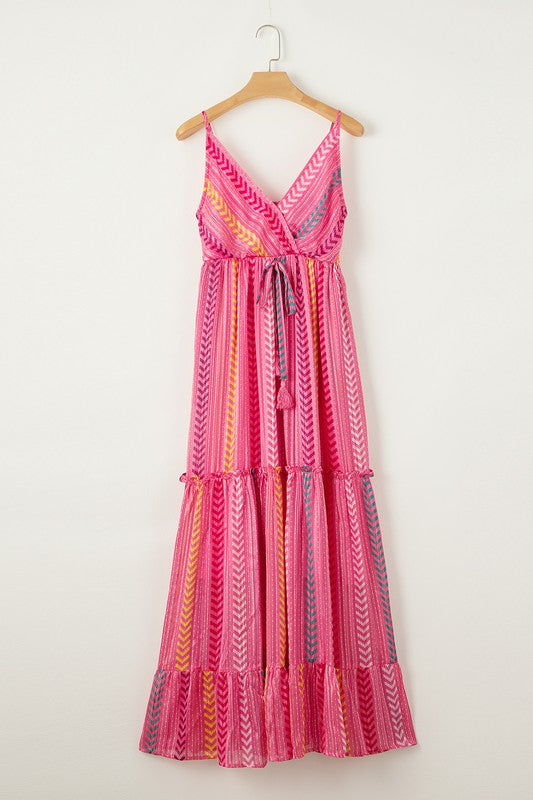This tribal-print tassel dress solves the “what do I wear?” dilemma for day-to-night plans—lightweight, flowy, and full of wanderlust energy, it’s made for brunch dates, music fests, and golden hour magic.

Discover the stunning Tassel Boho Dress from Shop Free Soul Threads. With flowing tiers, a flattering V-neckline, and eye-catching tassel ties, this dreamy pink maxi dress adds a vibrant, free-spirited touch—that you will reach for again and again.