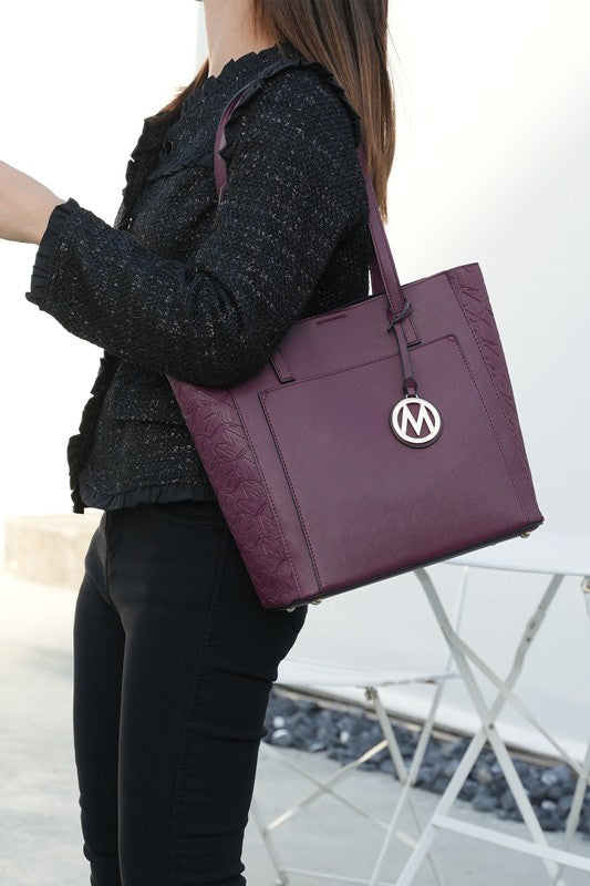 Sustainably Sleek Collection –Eco-Friendly Vegan Tote Bag. The Sustainability Sleek Collection is a unique collection that offers a WIN-WIN-WIN!  Eco-Friendly Tote Bag is made with high quality Vegan Leather- Win!
This stylish tote looks like it came off the runway, but at a wallet friendly price point- WIN!
This versatile tote compliments working, travel, evenings out, and everyday wear.  It's attention to detail and soft vegan leather conveys a polished look when you need  it.  Multiple colors available!