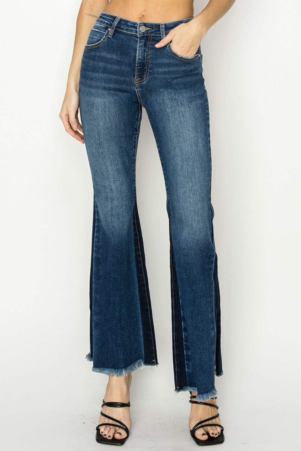 RISEN High Rise Jeans - Holy Grail Boho Split Flares.  Holy Grail of features you need and love!. Unique SLIT Flare! Imagine how you can show off your fav pair of boots, shoes, or sneakers creating a statement style!. 
 The shadow slit creates a double-take detail standing out anywhere and everywhere.  Can't wait for you to slide these on and have the look and confidence you love at your next event or while kicking back.  Medium Wash