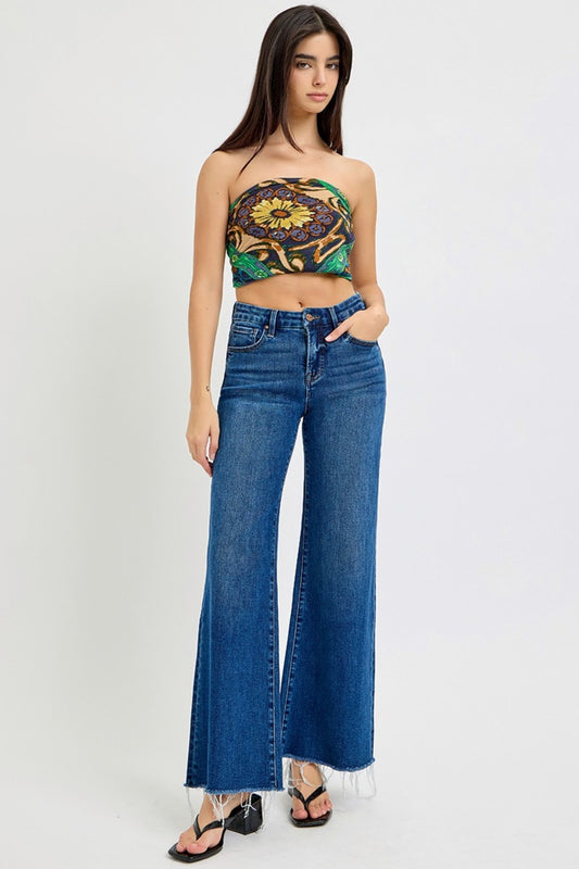 RISEN Tummy Control High Waisted Wide Leg Jeans with Stretch -Holy Grail.   Are you tired of form fitting skinny jeans?  Looking for a refreshing change; These tummy control wide leg jeans should do the trick.... offering a relaxed and laid-back feel!  These will be your go-to jeans if you prioritize comfort when going on a night out or keeping casual on the weekends.  Between the stretch, the high waist, and wide legs you are looking at the Holy Grail addition to your jean drawer!  Medium Wash.