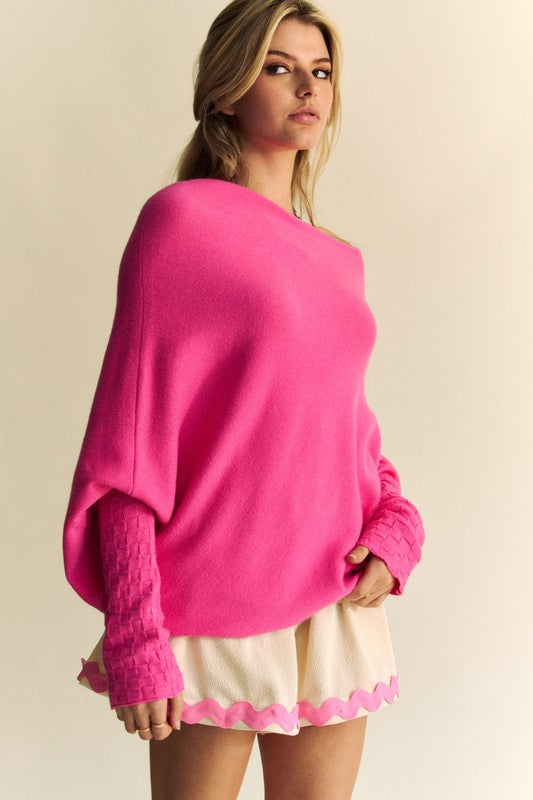 atwing Sleeve Sweater -Wild & Free Pink Batwing – Textured Cuffs, Untamed Style.  Did you know that the "Batwing Sleeve" is less restrictive and is designed to be visually distinctive with a draped silhouette that stands out from regular sweatshirts? If you love the unconventional or free-spirited aesthetic, this pink batwing sleeve sweater is a relaxed and cozy edition that will fit right into your wardrobe!. THIS sweater also happens to have a unique textured cuff... a real eye-catching feature