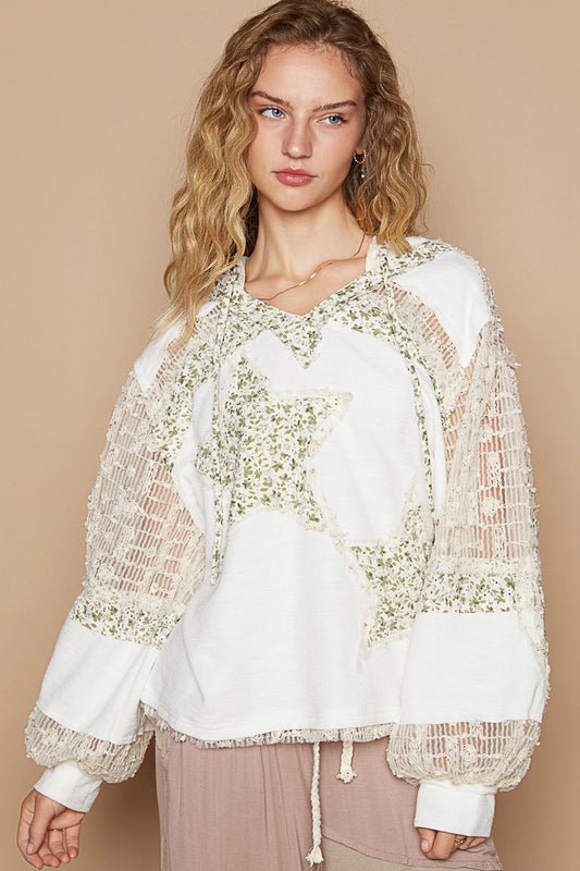 Whimsical Star Patch Hooded Shirt - A Feminine Twist on Rebel Style - Ivory Multi.   Does it feel sexy to be edgy and feminine at the same time? You got it! This star print adds some whimsy, and the lace contrast gives a delicate and elegant touch to the design. We love the mixed textures, making this top perfect for both casual and dressed-up looks.