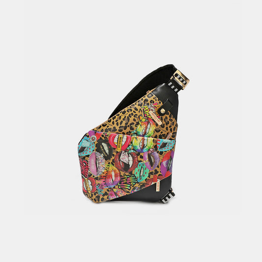 The Vegan Leather Leopard Lip Pattern Crossbody Bag is a bold accessory that makes a statement. Crafted from high-quality vegan leather. The bag features a striking print that exudes confidence and style. The adjustable crossbody strap allows for comfortable wear, while the compact size makes it perfect for carrying your essentials on the go. Whether you're heading out for a night on the town or running errands during the day, this bag adds a touch of flair to any outfit. 