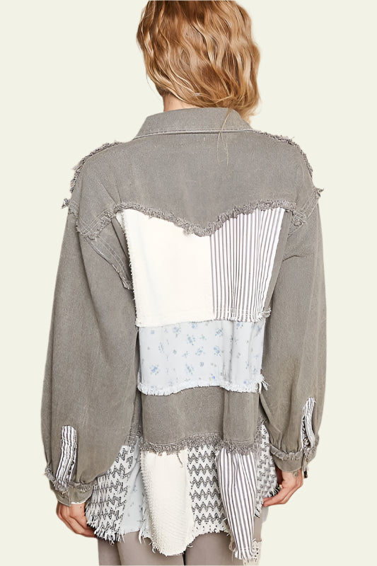 A raw hem patchwork dropped shoulder jacket is a cool and edgy addition to your wardrobe. The raw hem detail gives the jacket a distressed and laid-back vibe, perfect for a casual and relaxed look. The patchwork design adds a unique and eclectic touch, giving the jacket a one-of-a-kind appeal. The dropped shoulder style offers a loose and comfortable fit, making it a great layering piece for everyday wear. Pair this jacket with your favorite jeans and a basic tee for a stylish and effortless ensemble.