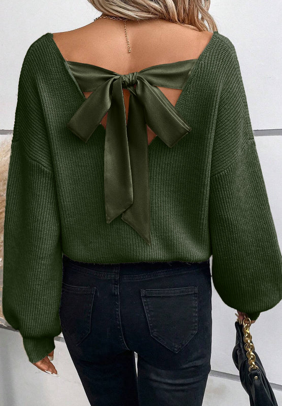 Thick and comfy feminine V-neck sweater. You can choose between (or get both) two gorgeous colors: a creamy beige and a hunter dark green. What else make's this long sleeve different? The feminine tied back bow!  This long sleeve sweater can be casual and carefree during the day and dressed up at night. Enjoy the bit of sexy edginess!