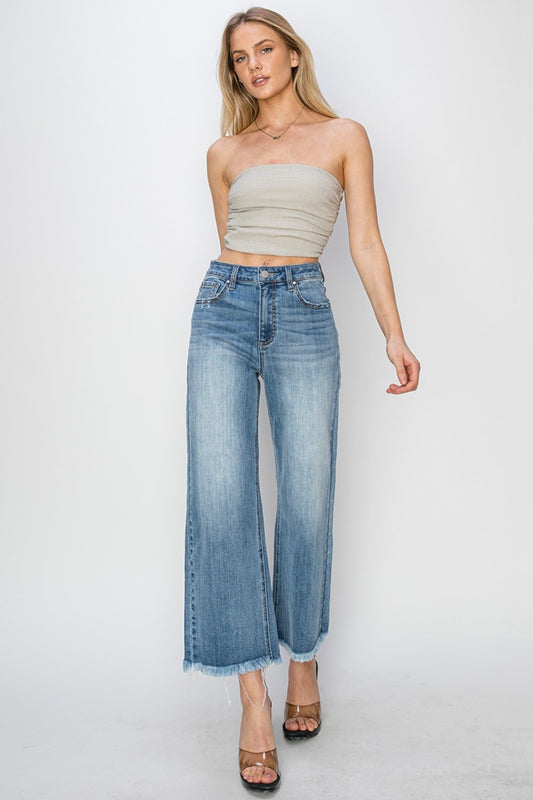 RISEN Wide Leg Jeans-Cropped Jeans- and Raw Hem with Plus Sizes - Boho Perfection.  Your other jeans might get jealous.... these have high rise and wide leg and together they can be quite flattering and then add on the edginess of the raw hem detail. 
 They are a go to classic and have a modern look.. They could easily be your go-to jeans..  Light Wash.