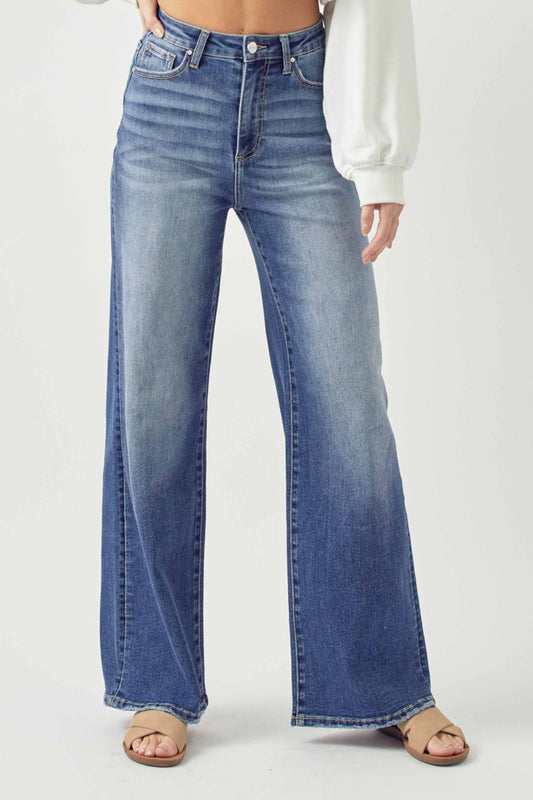 Risen Wide Leg High Rise Jeans with Plus Sizes.  A must have boho essential pair of jeans!&nbsp; Wide Leg, High Rise jeans are go-to jeans for any look, any day of the week! Effortless pairing all year long with your boho blouses! Snag you pair before they disappear! Medium wash.