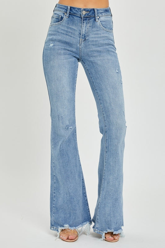 Risen High Rise Flared Jeans / Frayed Hem and Plus Sizes.   Perfect blend of classic retro vibes and iconic flair that never goes out of style!  Light Wash