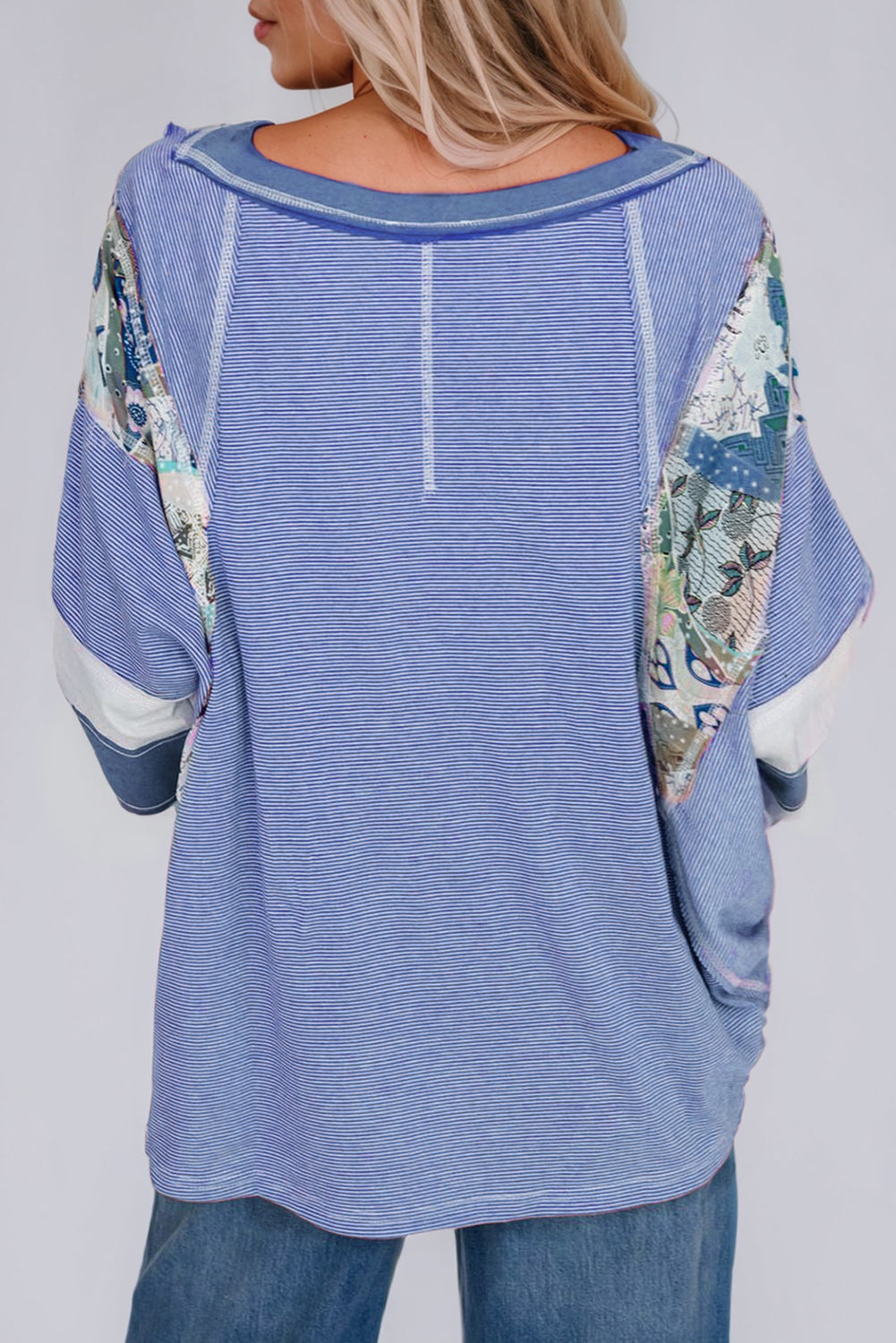 Feel your individuality showcased as you wear PERFECT boho top! This oversized 3/4 sleeve has vintage-inspired floral patches and a blend of vibrant colors. This oversized top is made for those who crave comfort and creativity. The oversized stripes and vintage style blooms create a one-of-a-kind, artsy vibe that’s as laid-back and free-spirited as you are. Whether you’re lounging or adventuring, in this top you can feel confident, carefree, and ready to embrace whatever comes your way!