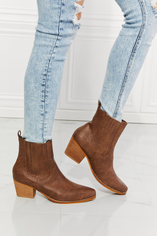 These boots are a balancing act between cowboy boots and Chelsea boots, featuring details of each style. They have a high-top and a stacked heel, as well as an elevated Chelsea panel and pointed toe. You can rock these stacked boots a pair of jeans, a leather jacket, or even a sharp suit. And with their sturdy construction and timeless design, these boots aren't just an accessory—they're an investment in style.