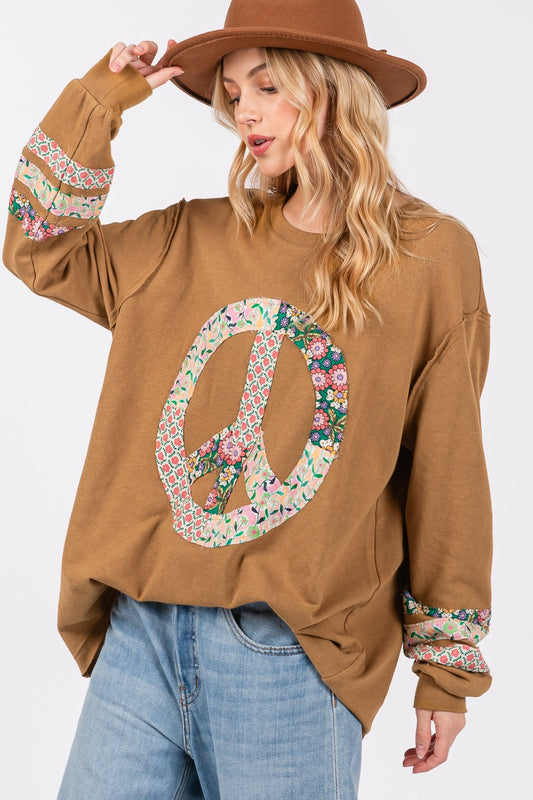 Oversized Long Sleeve Shirt- - Calm & Cool Crochet Peace Sign Top.  Are you a free- spirited gal, who likes a playful, relaxed, oversized style you can feel comfortable in that sends a peaceful vibe? This long sleeve shirt has banded cuffs and crochet to give your outfit unique features.
100% cotton.  bronze.  
