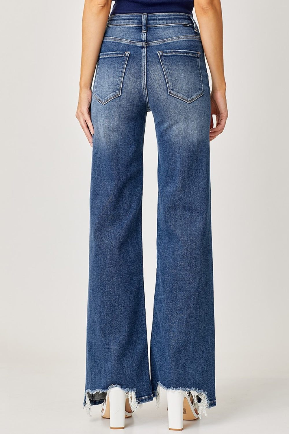 Risen Wide Leg High Rise Jean with Frayed Hem & Plus Size.  Attention all free spirits!!  This is the essential pair for your denim drawer! They are casual and look sweet with your favorite boho blouses! Scoop up a pair for you!!  Medium wash. 