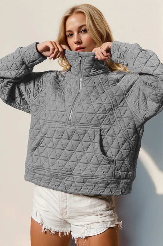 The quilted half-zip pullover has a free -spirit vibe of soft, cozy, feminine, and care-free. It looks so inviting to just pull on and have a relaxing day. Just Pick a color. This one is hard to resist!