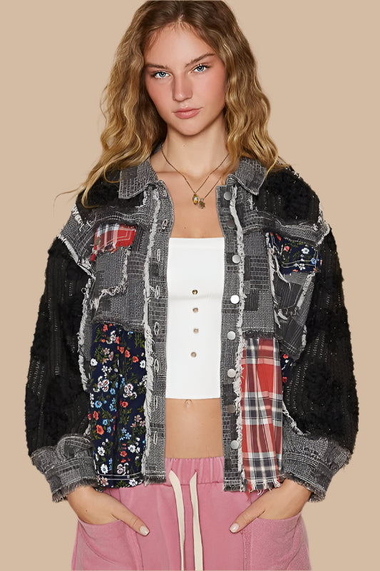 Want an artsy shacket?&nbsp; A bit oversized? This patchwork jacket is a true statement piece, crafted with intricate crochet detailing that brings a bohemian, handmade feel to your wardrobe. The mix of bold prints adds a touch of whimsy and individuality, making it a unique addition to any outfit. Whether you’re pairing it with jeans and a t-shirt for a relaxed, casual look or layering it over a dress for a more eclectic vibe, this jacket showcases your artistic, creative side. Wear it with confidence and 