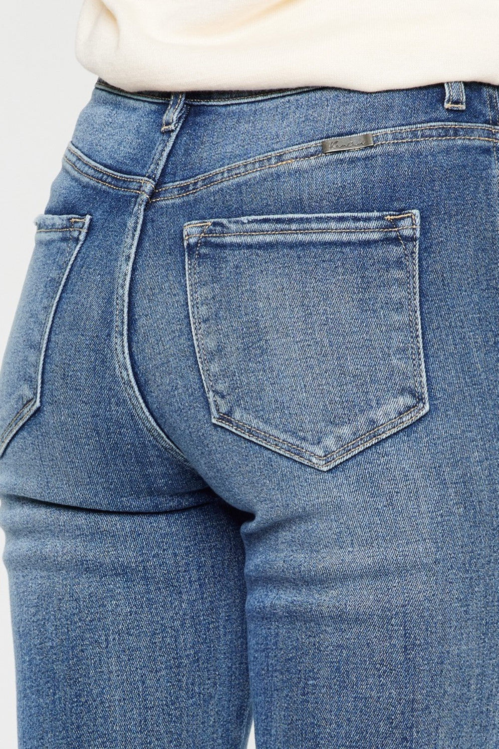 Kancan High Waist Flare Jeans - The Boho Western Cat Whiskerer.  Did you know about Cat Whisker's on jeans? Well, if you love the worn in, aged look then you will love the unique character it creates! We can't fail to mention how well flare jeans create the best retro or boho/western outfits! Your other jeans will be jealous at how many ways you can wear these jeans! Sounds like a valuable add to your jean collection!