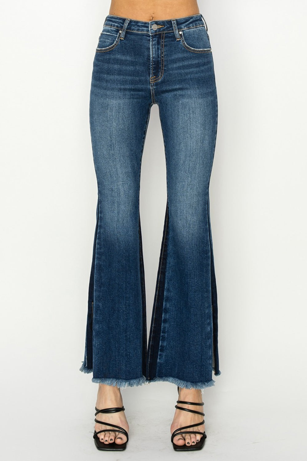 RISEN High Rise Jeans - Holy Grail Boho Split Flares.  Holy Grail of features you need and love!. Unique SLIT Flare! Imagine how you can show off your fav pair of boots, shoes, or sneakers creating a statement style!. 
 The shadow slit creates a double-take detail standing out anywhere and everywhere.  Can't wait for you to slide these on and have the look and confidence you love at your next event or while kicking back.  Medium Wash