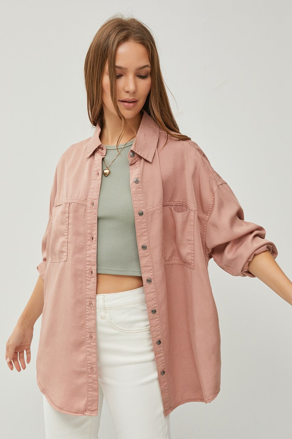RISEN Button Up Long Sleeve Denim Shirt 100% TENCEL ECO FRIENDLY and Plus Size.  This Denim dream shirt CAN'T STOP WON'T STOP!

It is made TENCEL, an exceptionally soft fabric that's hypoallergenic and well suited for sensitive skin.
Resists pilling
Eco-friendly fabric made from wood pulp cellulose fibers
Shrink-proof (maintains size and shape after washing)
Durable enough for everyday use, making it a long-lasting investment for stylish and sustainable clothing. Mauve.