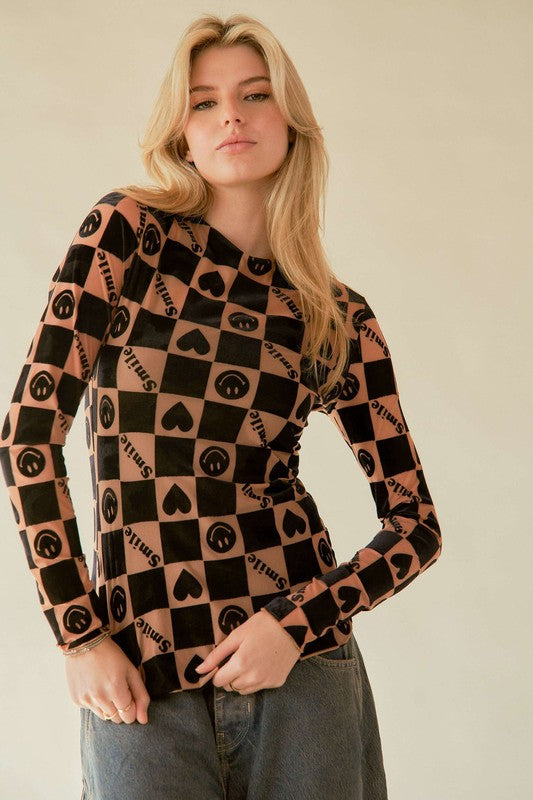 The Heart Print Long Sleeve Top is a charming and playful addition to your wardrobe. The heart print adds a sweet and feminine touch. Like to wear hearts for Valentines, but want something other than pink? Then this top Rocks a style that matches better to your individuality! It is ideal for layering under jackets or cardigans. Pair it with jeans or skirts for a fun and romantic look that is perfect for any casual outing.


STOCK IS VERY LIMITED....GET YOURS SOON!
