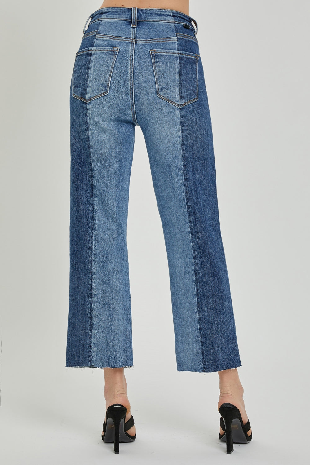 RISEN Two-Tones Jeans with Pockets and Plus Size - DOUBLE VISION. Spice up your wardrobe with Risen's unique two-toned denim style that shows off an upcycled vibe. The relaxed fit effortlessly transitions from day to night with just a quick accessory change. Two-toned light and medium wash. 